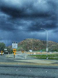 Road against cloudy sky