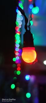 Close-up of illuminated christmas lights at night