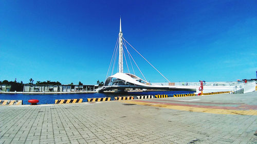 Scenic view of buildings against clear blue sky