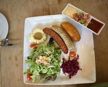 High angle view of breakfast served on table