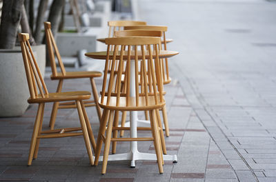 Cafe table on sidewalk side city street