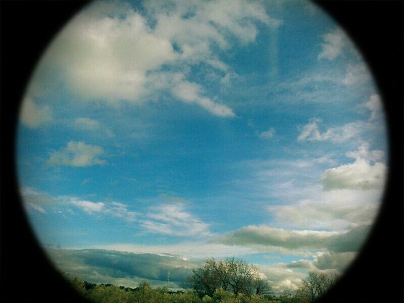 sky, cloud - sky, scenics, tranquil scene, tranquility, beauty in nature, cloud, landscape, nature, fish-eye lens, circle, cloudy, idyllic, no people, silhouette, cloudscape, day, outdoors, blue, transparent