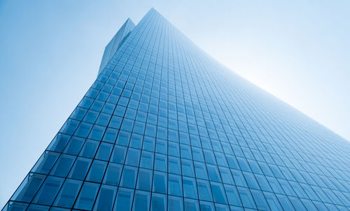 Low angle view of modern building against clear sky