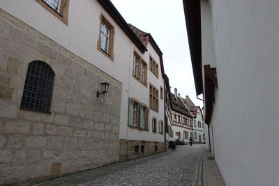 Street amidst buildings in town