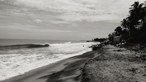 Scenic view of beach against sky