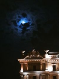 Low angle view of historical building at night