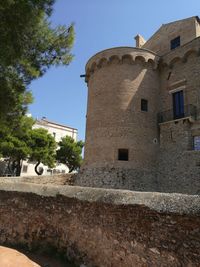 Low angle view of built structure against clear sky