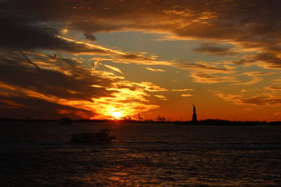 Scenic view of sea at sunset