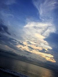 Scenic view of sea against sky at sunset