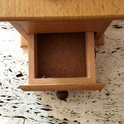 Close-up of box on sand