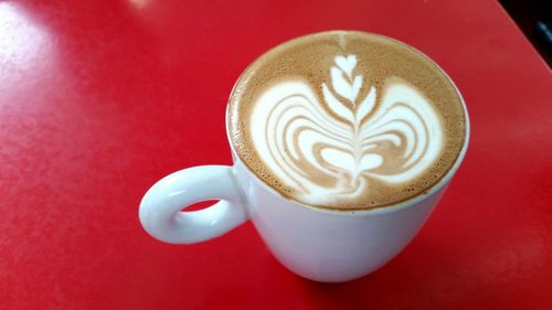 Close-up of cappuccino on table