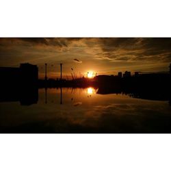 Scenic view of sunset over river