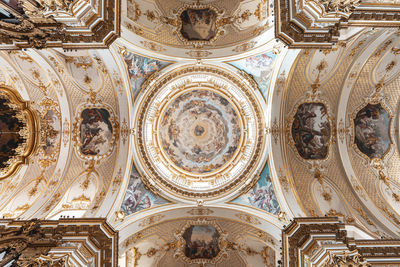 Low angle view of ornate ceiling of building