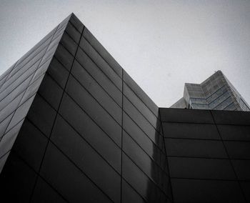 Low angle view of skyscraper against clear sky