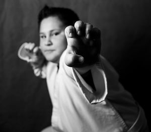 Portrait of boy doing martial arts