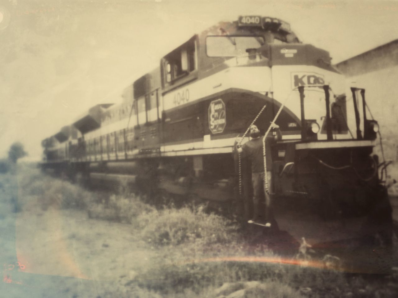 built structure, architecture, transportation, building exterior, mode of transport, land vehicle, abandoned, old, train - vehicle, no people, obsolete, day, reflection, wall - building feature, indoors, old-fashioned, car, industry, public transportation