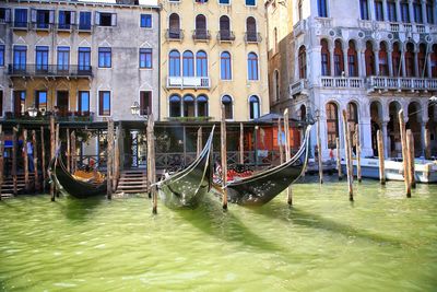 Boats moored in canal