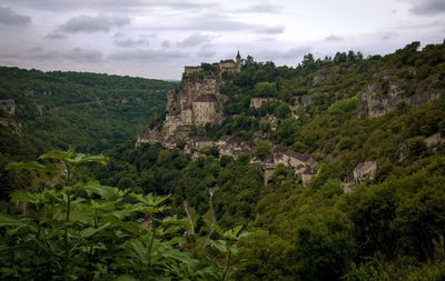 View of castle on mountain against sky