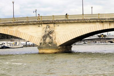 Arch bridge over river