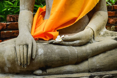 Close-up of buddha statue in temple