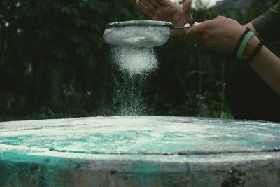 Close-up of human hand in water