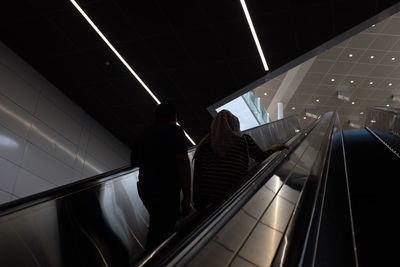 People on escalator