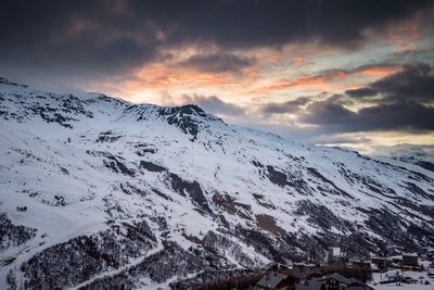 Scenic view of mountains against sky during winter