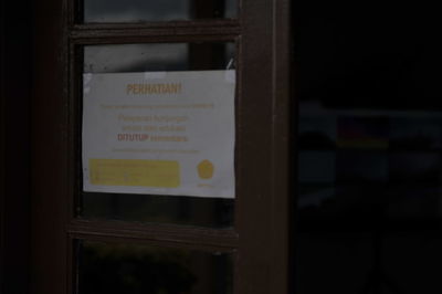 Close-up of text on wall