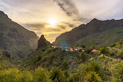 Scenic view of mountains against sky during sunset