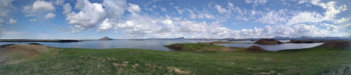 Panoramic view of sea against cloudy sky