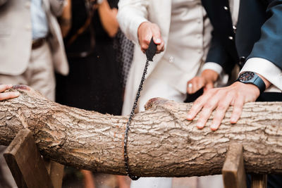 Midsection of people working