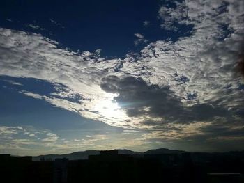 Scenic view of cloudy sky at sunset