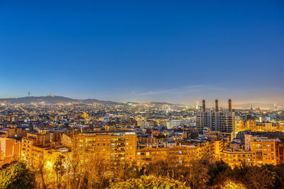 Barcelona at dusk seen from montjuic mountain