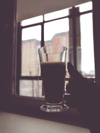 Close-up of drink on table at home