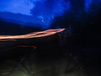 Close-up of water against sky at night