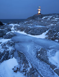 Lighthouse on rocky coast