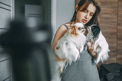 Portrait of woman with dog
