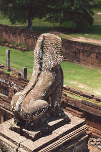 Close-up of old statue in park