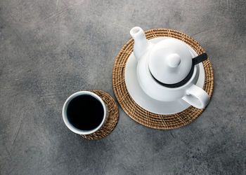 High angle view of coffee cup on table