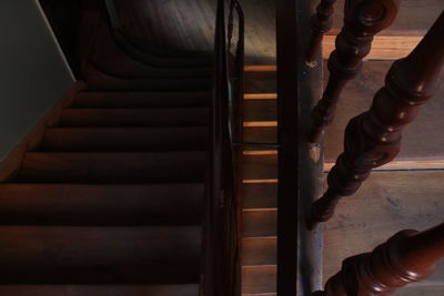 Low section of person on spiral staircase