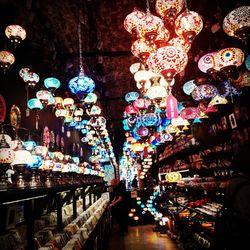 Illuminated lanterns in market at night