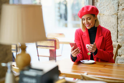 Young woman using mobile phone