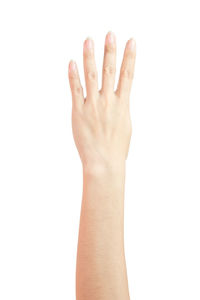 Close-up of human hand against white background