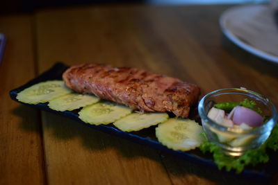 High angle view of meat in plate on table