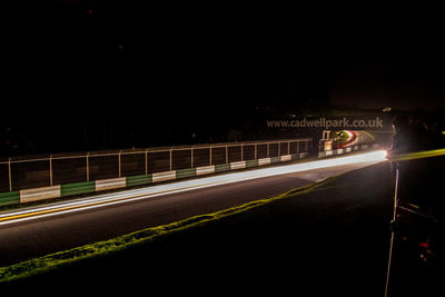 Light trails on road at night