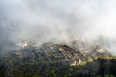 Machu picchu in thick fog