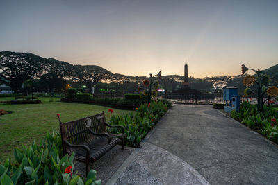 Scenic view of city against sky during sunset