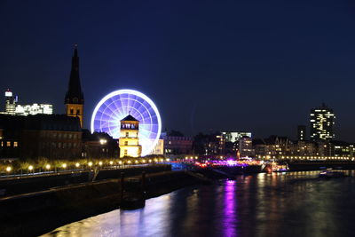 View of illuminated city at night