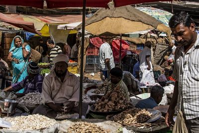 People at market stall