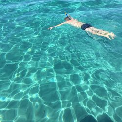 High angle view of man swimming in pool